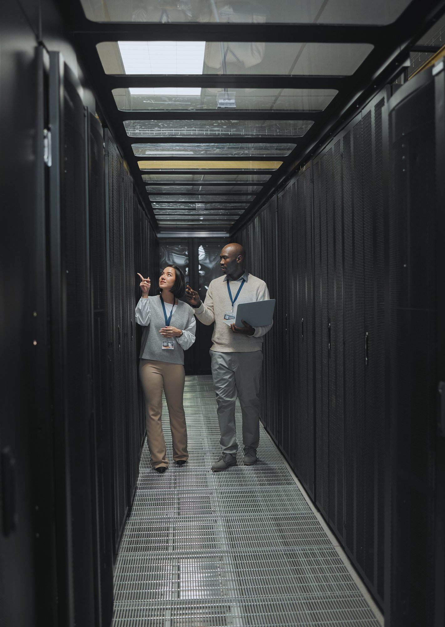 laptop-teamwork-or-it-people-in-server-room-for-m-2023-03-02-02-44-29-utc